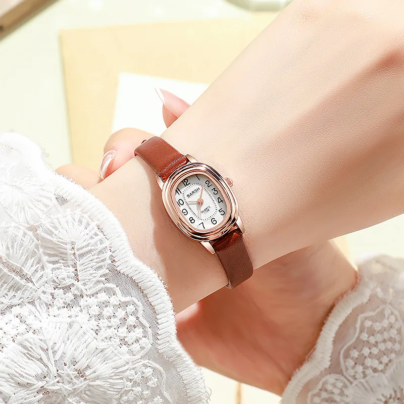 

An oval-shaped small dial women's watch with a unique, high-end feel, simple student retro and light luxury Korean version