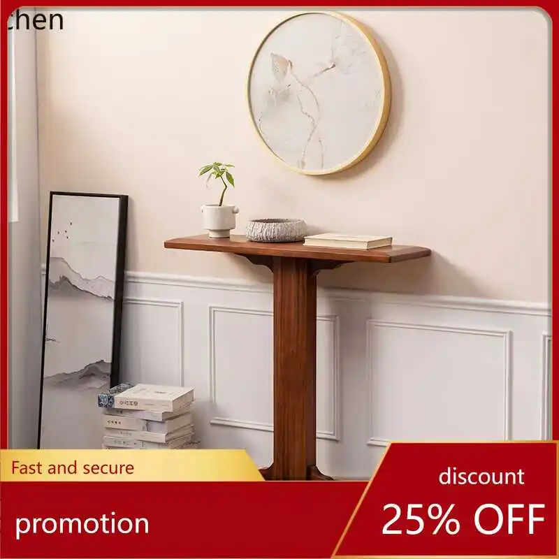 

HT against the wall, a few very narrow small strips, a few and the entrance door is facing the decorative cabinet rack.