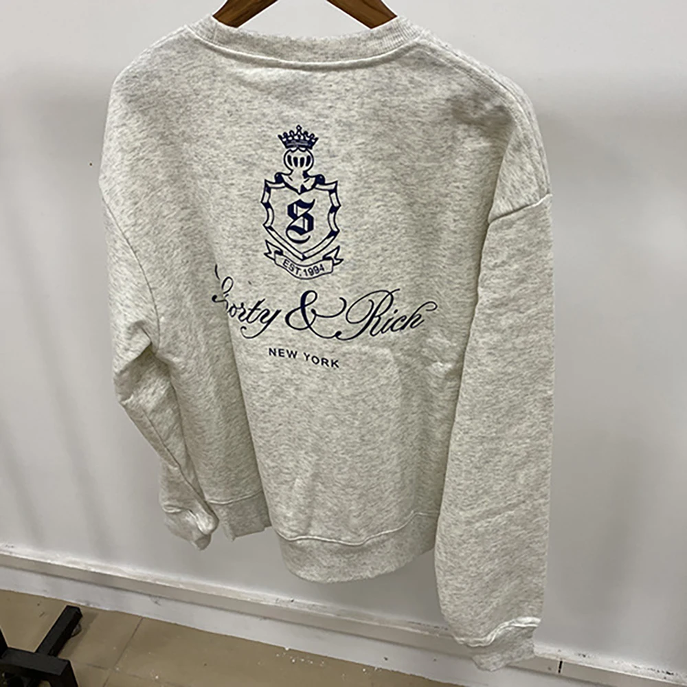 S5W233 أنماط الشتاء الجديدة أمريكا الشمالية الكلاسيكية المرأة البلوز حروف تاج طباعة الأعلى