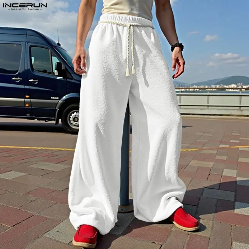

INCERUN Men Pants Solid Color Elastic Waist Joggers Lace Up Trousers Men Streetwear Loose Fashion Casual Wide Leg Pants S-5XL