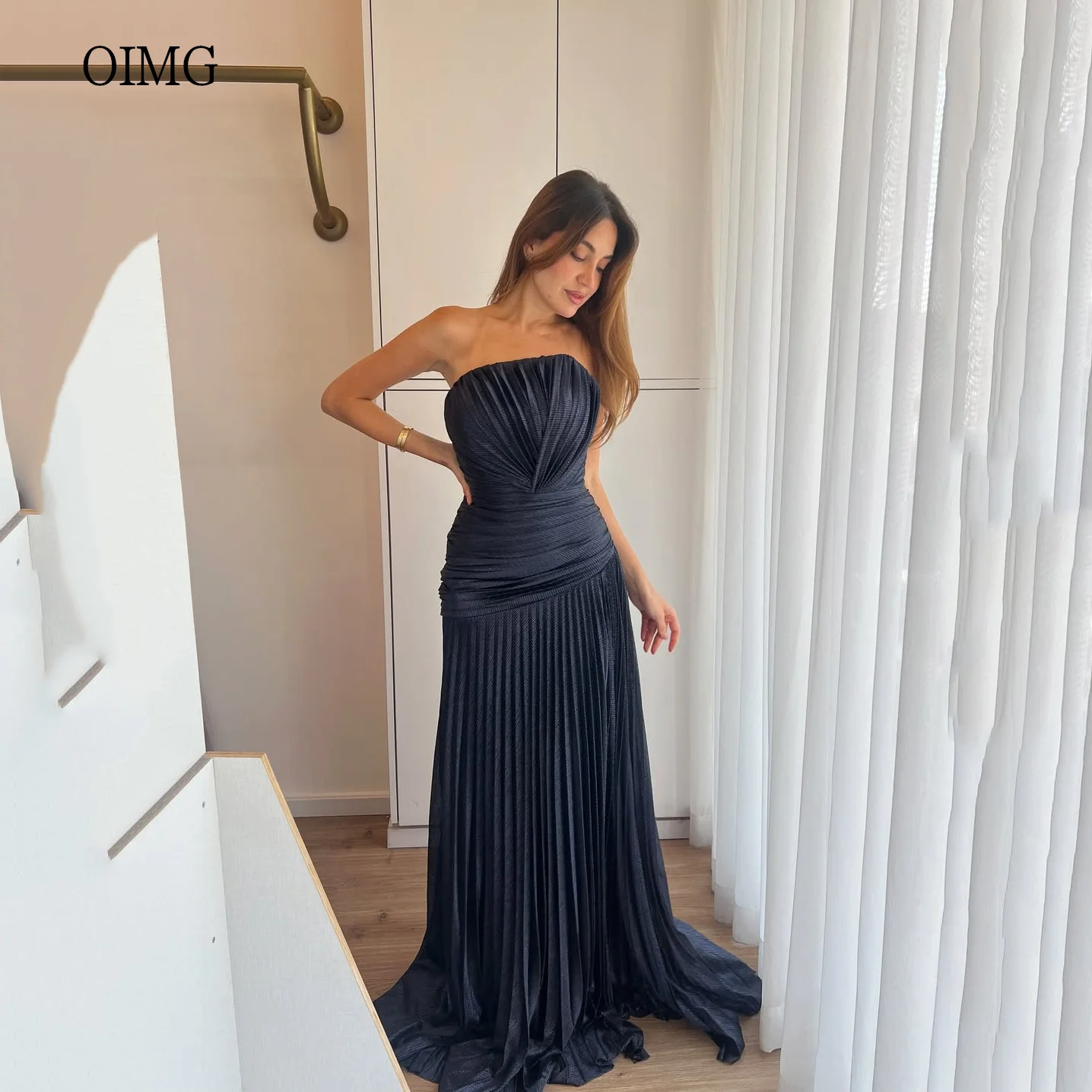 

OIMG Trendy Navy Blue A Line Prom Gowns Strapless Backless Tiered Party Gown Floor Length Evening Dress 2025 Customized