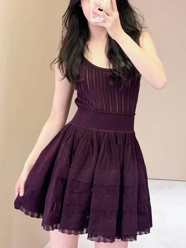 Elegant and slim-fitting knitted vest dress for women; 2026 fashionable openwork sleeveless A-line dress.