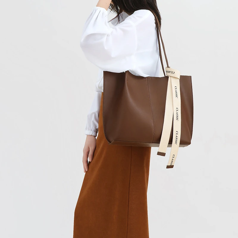 

2026 Women New Hot Sale Genuine Leather Tote Bag Lady Large Capacity Shoulder Bag Female Daily Commute Fashion Versatile Handbag