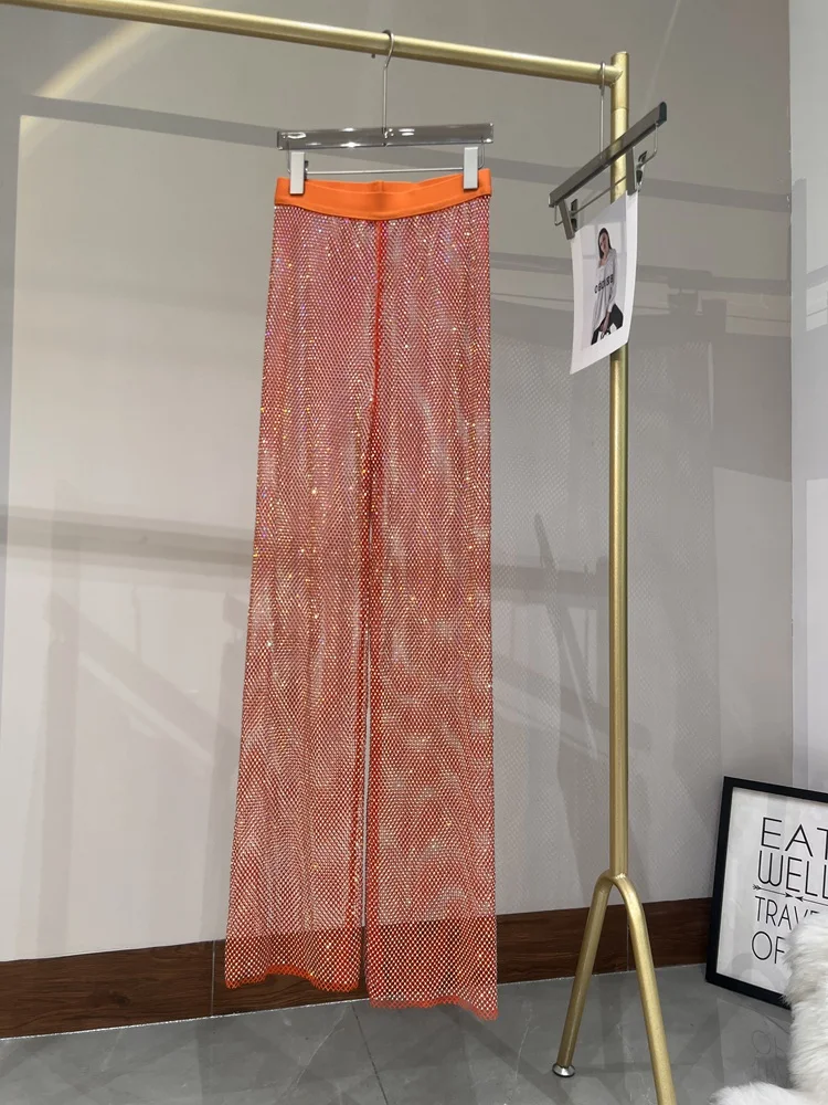 Sommer Sexy ausgehöhlt europäischen und amerikanischen Wind AB Farbe Diamant Flash Grid Strass weitbeinig Hosen Nachtclub