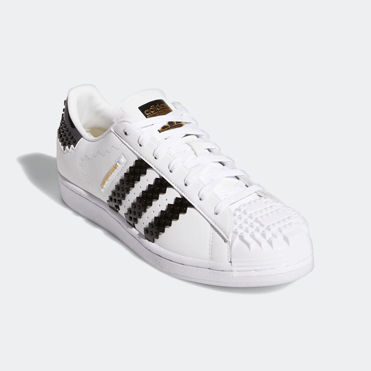 حذاء رياضي Adidas Genuine Originals Superstar للجنسين بمقدمة صدفية GW5270