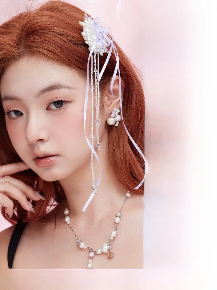 エレガントなパールタッセルヘアクリップ女性用バタフライノットサイドヘアアクセサリートレンディなデザインヘアジュエリーファッショナブルなヘアピン