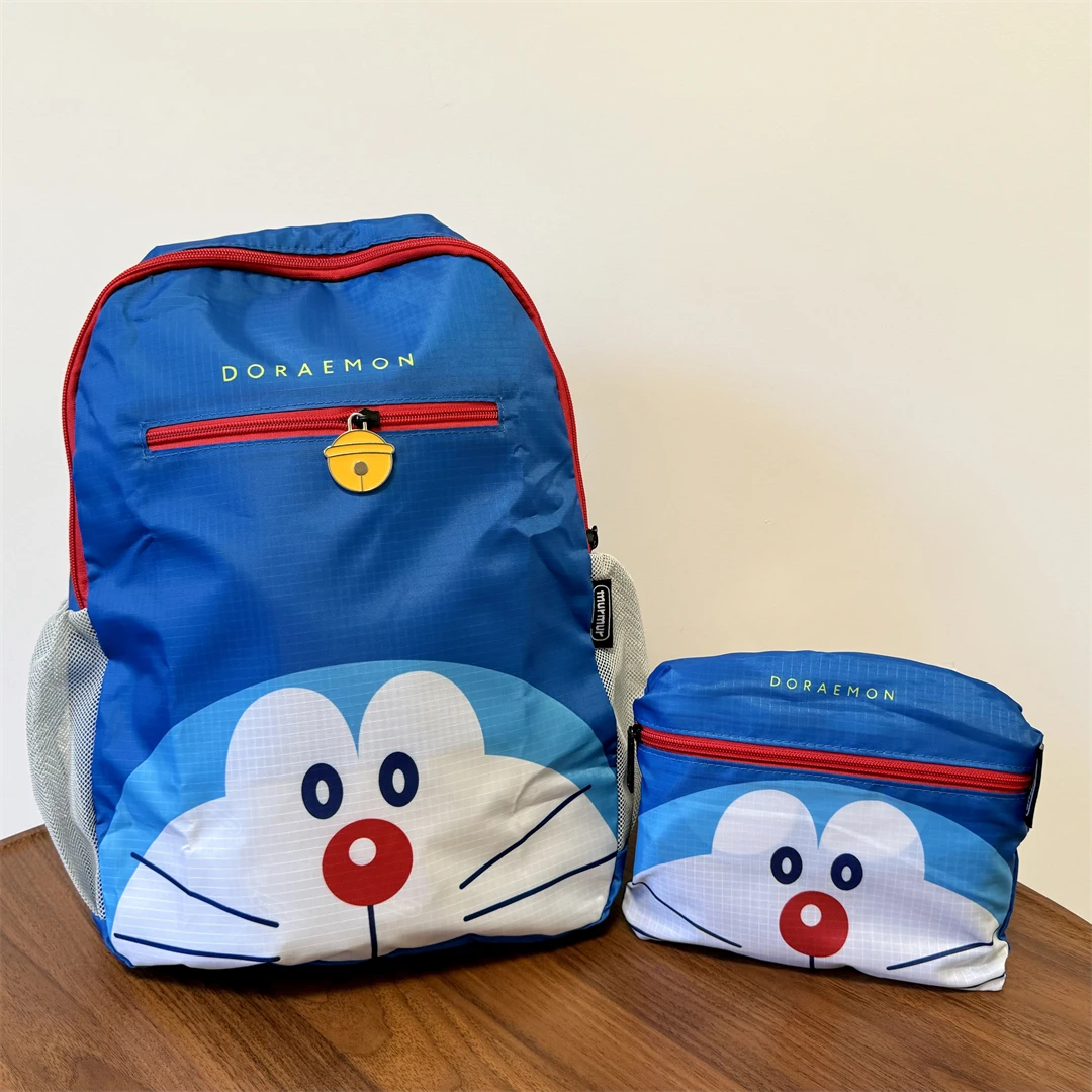 

Miniso Japan cartoon Doraemon multi-functional foldable backpack large-capacity student class bag commuter sports bag For Kids