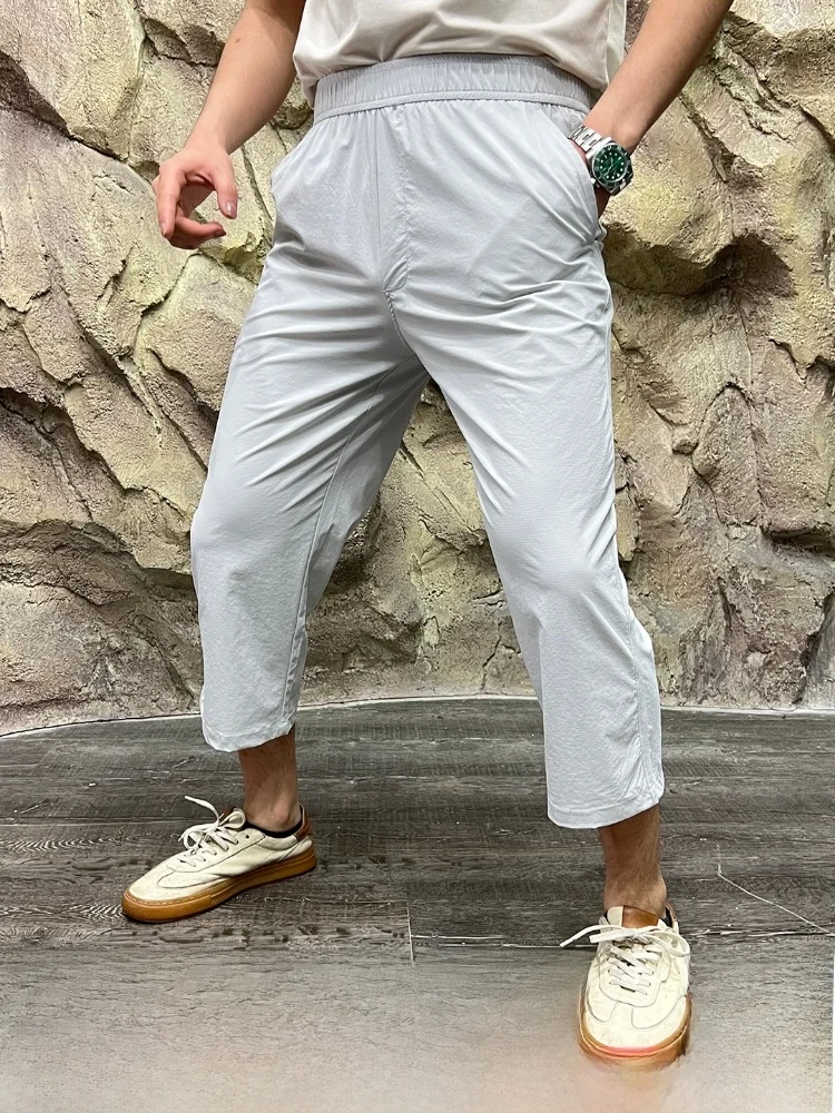 

Men's Lightweight Qui-Dry Breathable Elastic Seven-Foot Casual Pants Spring Summer Faionable Ci Outdoor Sle Polyester...