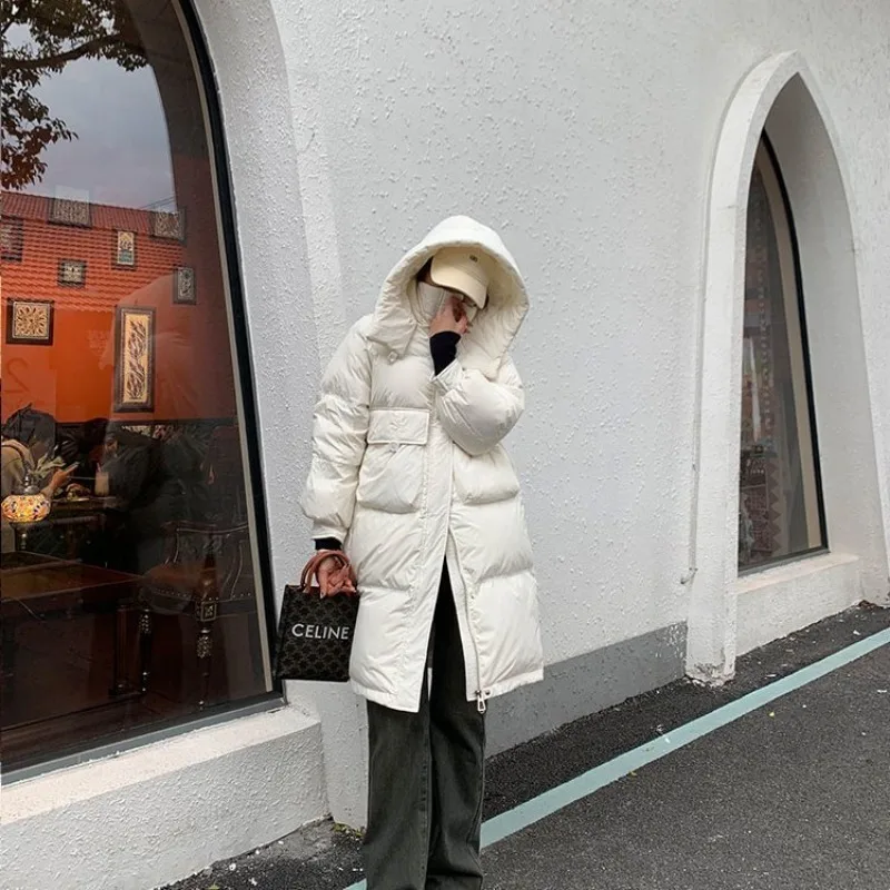 2023 neue Frauen Daunen jacke Wintermantel weibliche mittellange Version Parkas lose dicke warme Outwear Mode Nische Kapuzen mantel