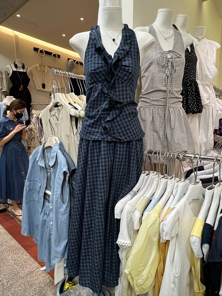 

2025 summer new spicy girl plaid hanging neck backless vest high waist slimming half skirt women's elegant two-piece set