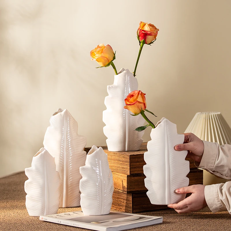 

Ceramic vase - Nordic minimalist creative design, white leaves, suitable for home and living room flower arrangement.