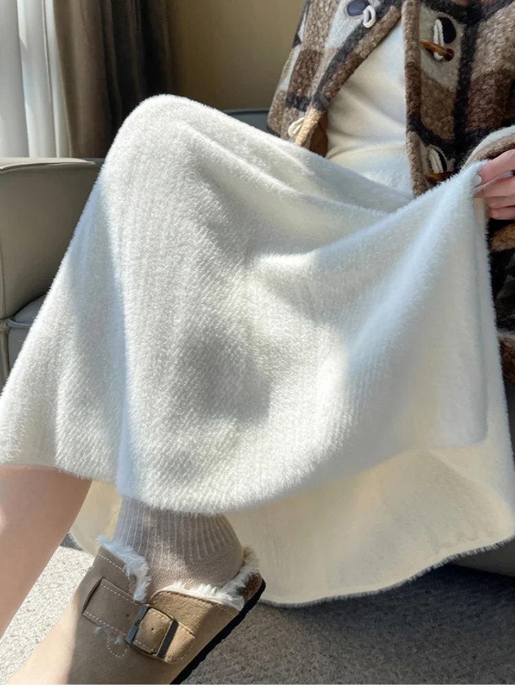 

SMTHMA Soft Mink fur thickened warm skirt for women autumn winter mid length high waist arge swing knitted A-line skirt