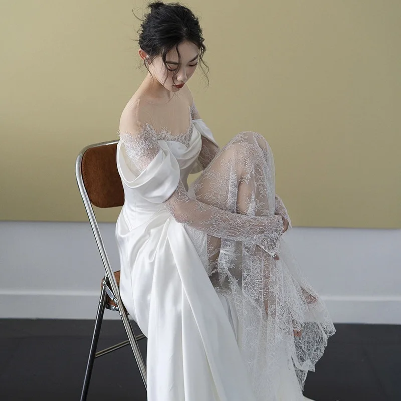 Eleganti abiti da sposa a maniche lunghe in pizzo o-collo bianco a-line lunghezza del pavimento Sweep Train Side fessura abito da sposa con cerniera in raso 2024