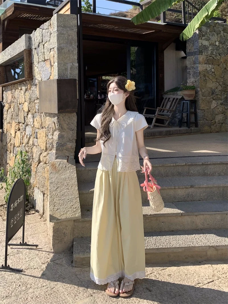 Blue Petal Hollow Stickerei ort Sve Damen Sommer Puppenkragen irt Sweet Sle Loose Fit Polyesterfaser Casual Top