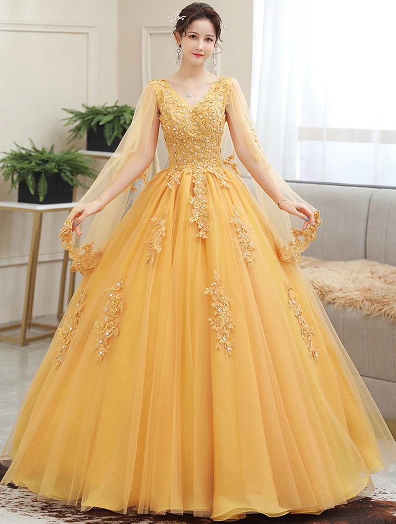 Golden ชุดไปงานเต้นรำ Quinceanera กับ Cape V คอลูกไม้ Appliques Beaded เจ้าหญิงชุดราตรีหวาน16ชุด Vestido De 15 anos