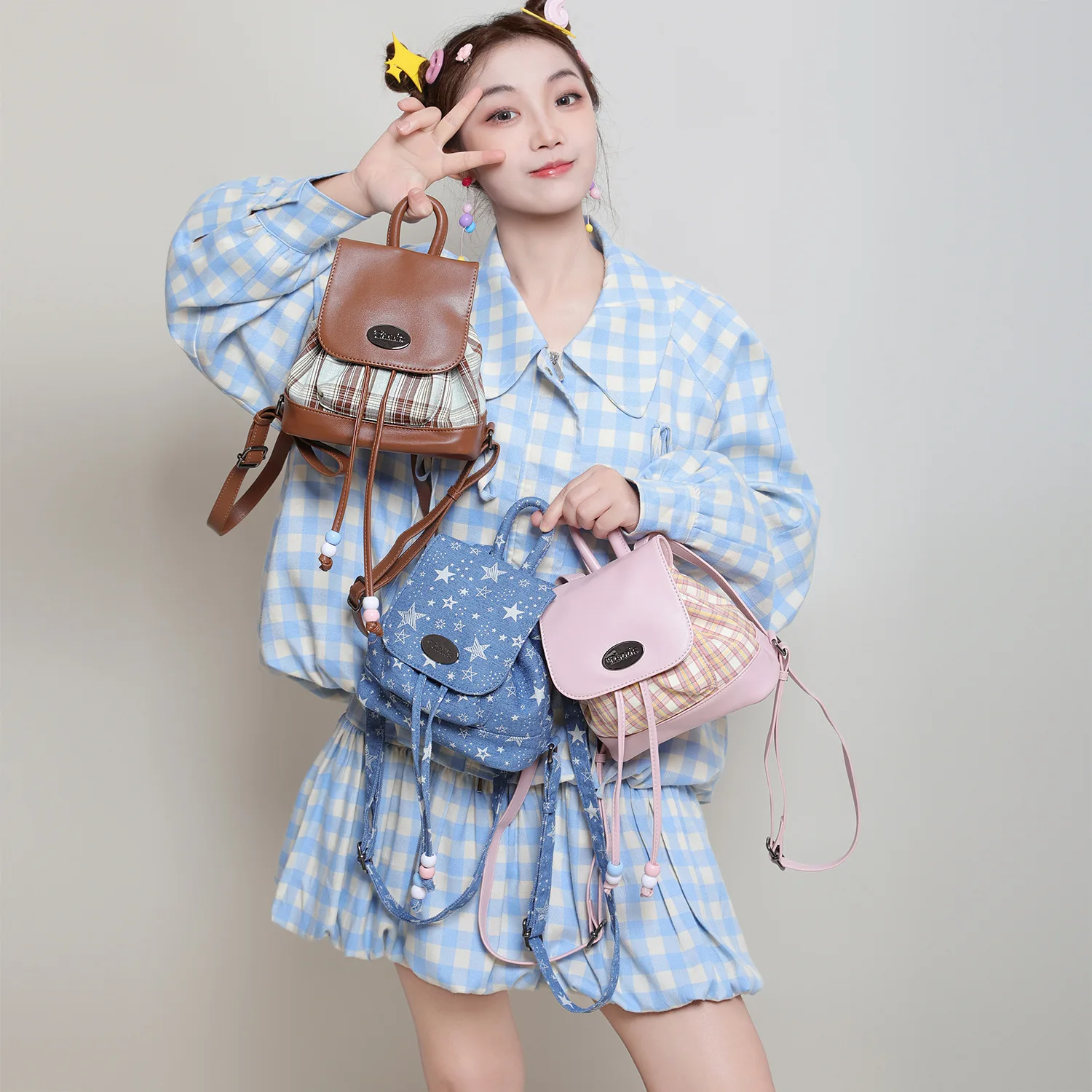 Denim and PU leather stitched women's small backpack with striped and color-matching design, cute and eye-catching travel bag