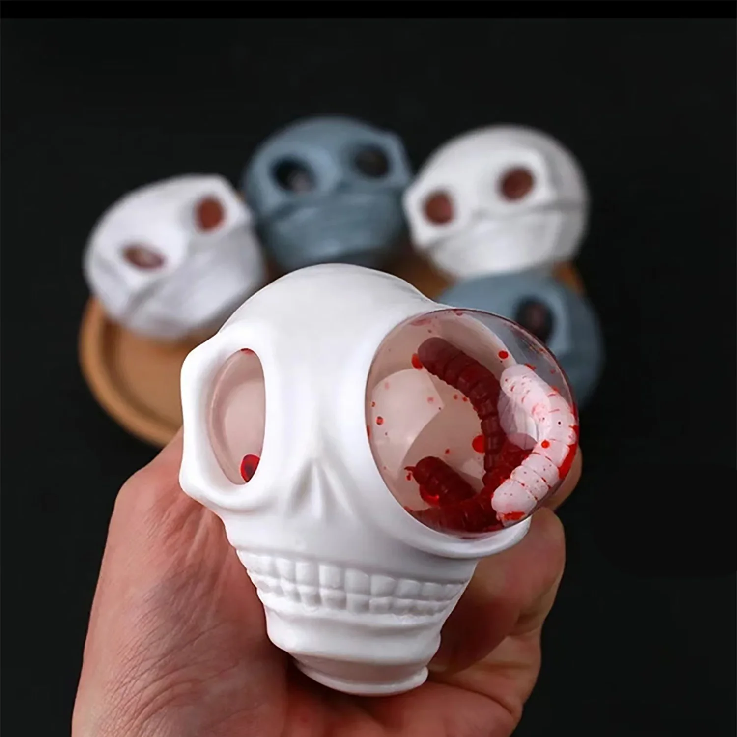 

Skull head squeezing insect prank toy Halloween decoration prank venting spoof stress relieving artifact