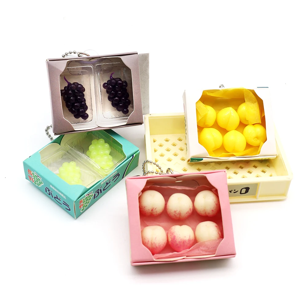 Simulated Japanese food toy fruit pinching keychain cute mini peach grape Q-pop decompression pendant twist egg contents