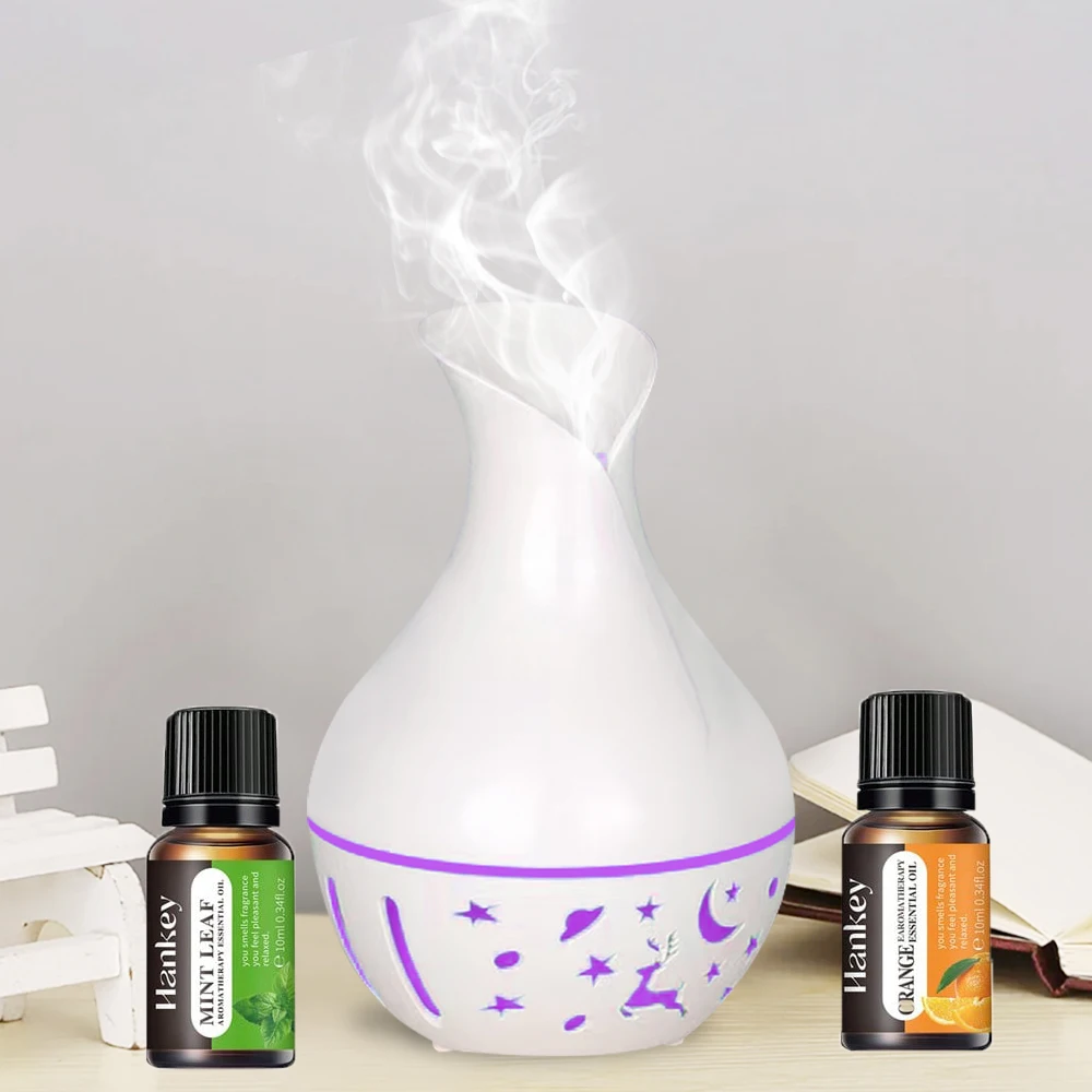 

Mini USB Humidifier Aroma Diffuser 7 LED Color Humidifier 200ml Capacity Ultrasonic Air Humidifier Cool Mist for Home with two b
