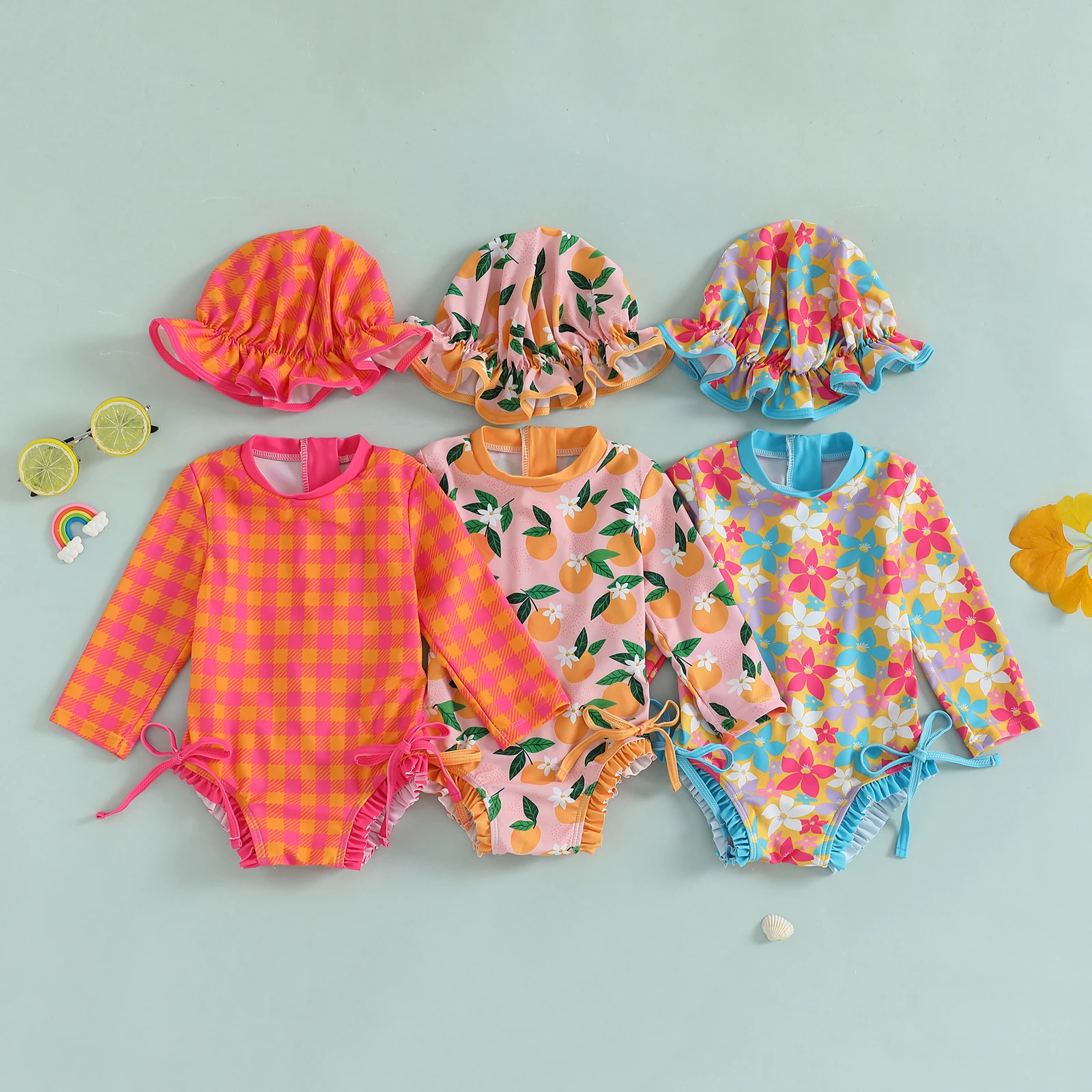 

Lioraitiin Toddler Kids Girl Swimsuits Plaid/Flower/Fruit Print Ruffles Rash Guard Swimwear and Swim Cap Bathing Suits