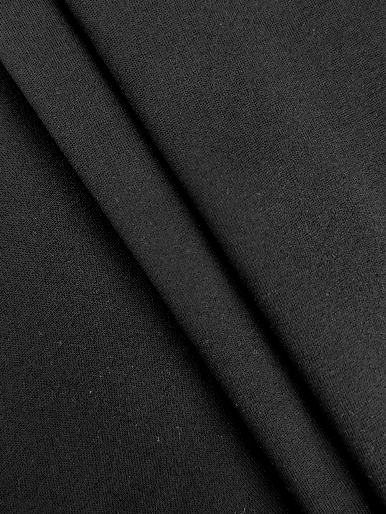 夏の女性のファッションカルビンレタープリントカジュアルセクシーなスリムフィットタイトフィット半袖ラウンドネック Tシャツミニスカート