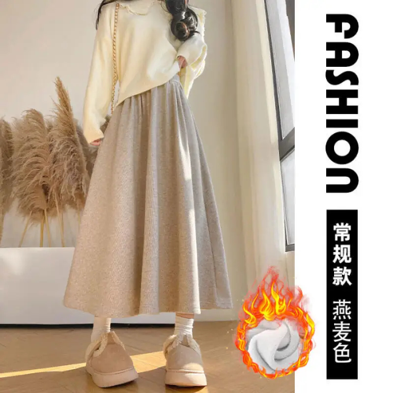 กระโปรงทรงเอไลน์สีข้าวเหนียวสีขาวข้าวโอ๊ต กระโปรงทรงเอไลน์ยาวปานกลางสำหรับผู้หญิง กระโปรงทรงเอไลน์ทรงร่ม สำหรับฤดูใบไม้ร่วงและฤดูหนาว กระโปรงลำลองเอวสูงสำหรับผู้หญิง สไตล์สบายๆ