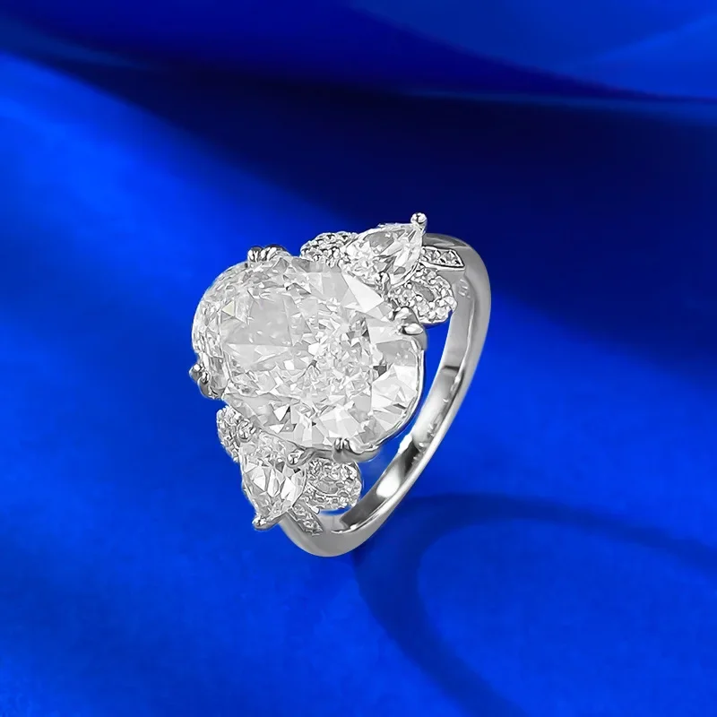 

New European and American S925 Silver Imported High Carbon Diamond 9 * 13 Pigeon Egg Bow Ring Ring Jewelry