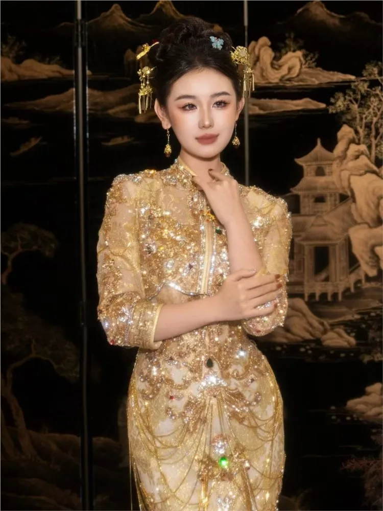 

Heavy Industry's new champagne-colored fishtail dress wedding toasting gown and