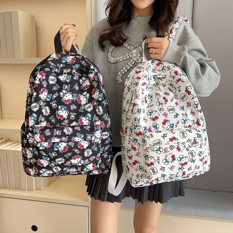 

Sanrio hello kitty Student Schoolbag Large Capacity Backpack Y2K Graffiti Boys and Girls Travel Bag Handbag shoulder bag