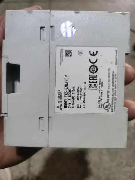 Modulo, FX5-ENET/IP, severamente urtigato. Crepe, tiro fisico, confezione funzionale,