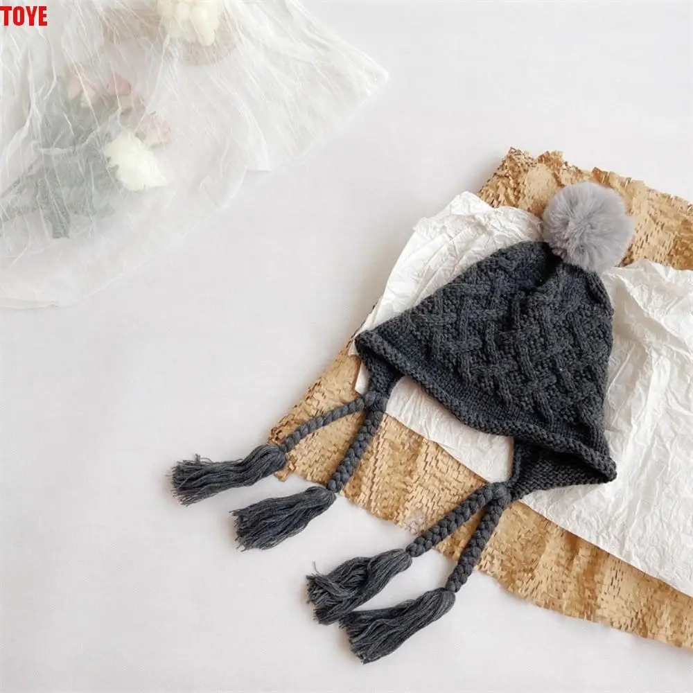 

Korean Autumn Winter Baby Crochet Hat Pom-pom Soft Warm Hand Knitted Cap Tassel Pigtail Outdoor Ear Protection Cap Kids
