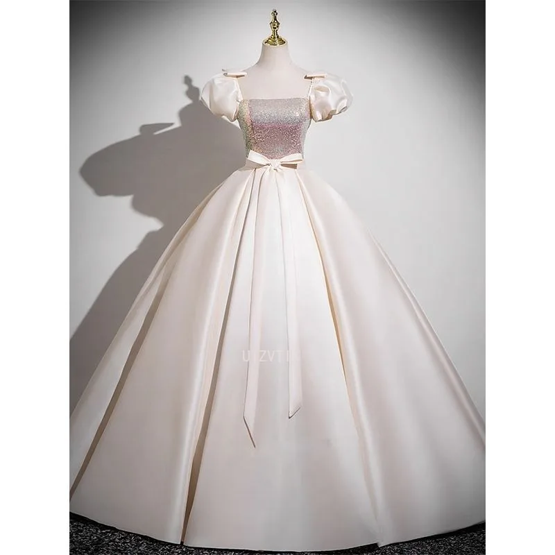 أثار أعلى مخصص الشمبانيا الساتان نفخة قصيرة الأكمام فساتين حفلات الدانتيل متابعة vestidos de noiva فساتين السهرة الرسمية مع القوس