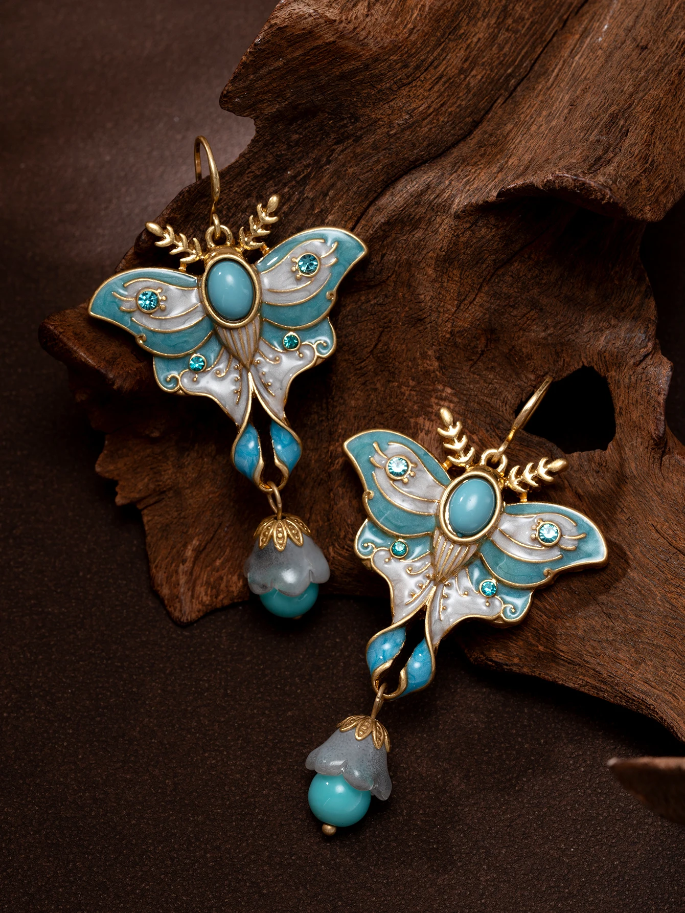 New Chinese-style light blue butterfly turquoise earrings, vintage carved light luxury niche long earrings