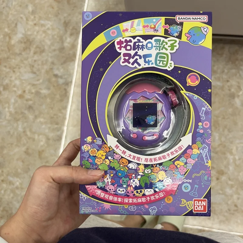 

New Original Bandai Tamagotchi Electronic Pet Machine Paradise Joyful Playground Blue Purple Pink Highly Playable Model Toys Gif