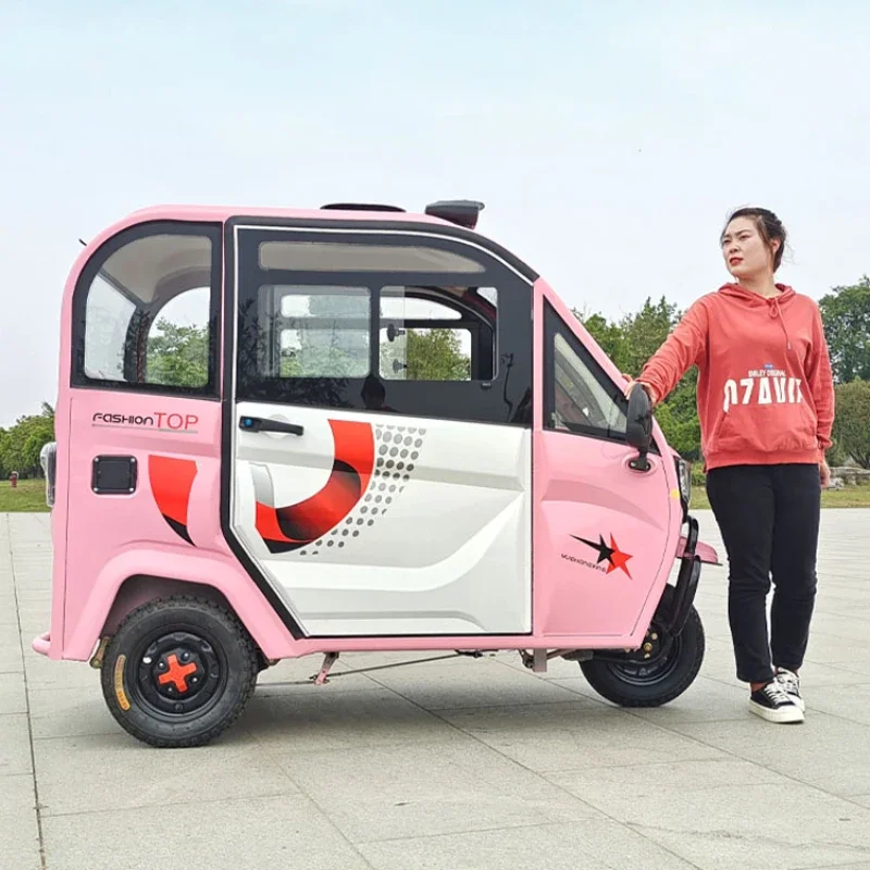 enclosed electric tricycle with shed for home transportation of children, small delivery battery, three cars can be licensed