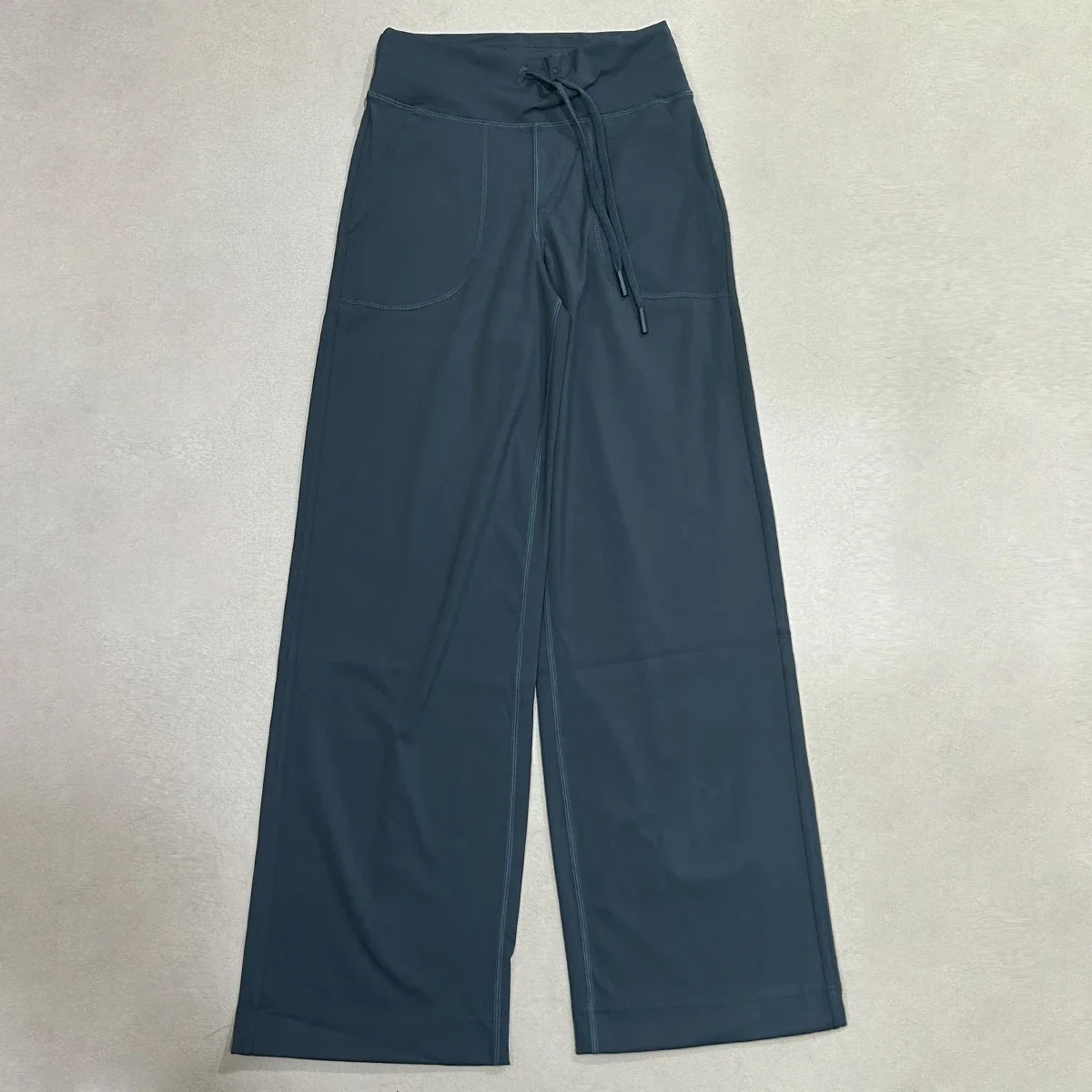 Szerokie spodnie z kieszeniami damskie luźne legginsy do jogi z wysokim stanem ze sznurkiem outdoorowe codzienne spodnie do biegania na siłownię sportowe spodnie typu flare