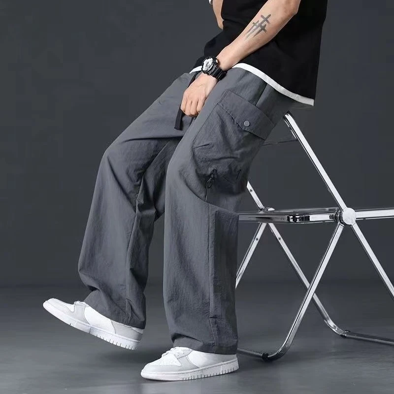 Męskie spodnie oversize na wiosnę i lato, proste, czarne, w stylu koreańskim, nowość, estetyczne, tanie spodnie typu slacks, nylonowe spodnie cargo streetwearowe dla mężczyzn.