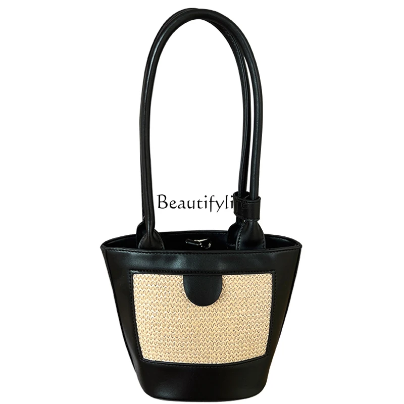 

Korean version niche design straw woven portable bucket bag retro hand carry shoulder armpit bag