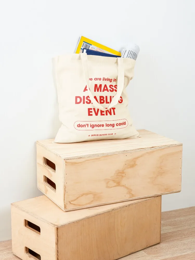 we are living in A MASS DISABLING EVENT / don't ignore long covid Tote Bag