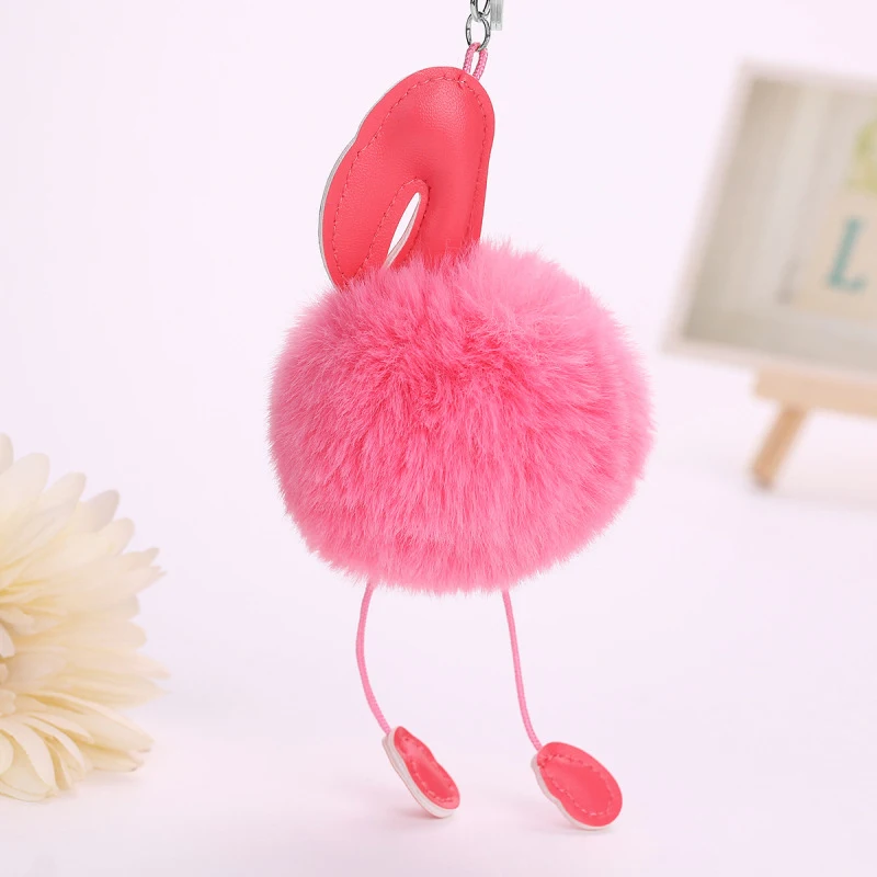 Image 6: Porte-clés Pompon Flamingo Moelleux pour Femme, Porte-clés Boule de Fausse Fourrure de Lapin, Sac Pompon, Porte-clés de Voiture, Cadeau Original, Nouveau
