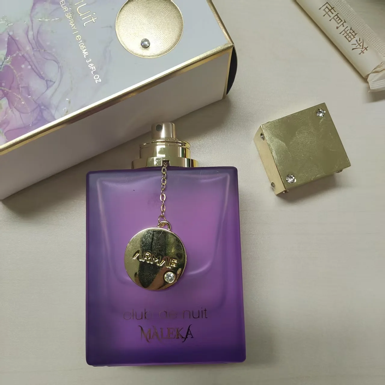 

Armaf Club De Nuit Maleka Women's -3.4 oz (about 100ml) EDP spray, purple design, lasting fragrance, the best gift choice