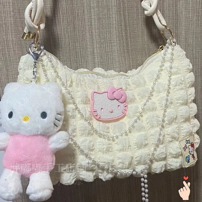 Sanrio-Bolso de hombro con cadena de perlas para niña, bolsa de mano con contraste de Color de Hello Kitty, a la moda