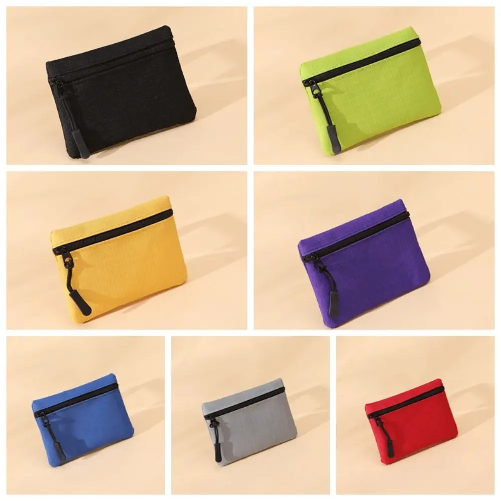 Monedero de tela de buey de estilo coreano Simple, bolso de artículos pequeños con cremallera de Color sólido, monedero, tarjetero, bolsa de almacenamiento de tarjetas para hombres