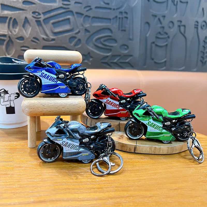 Lega creativa tirare indietro auto moto portachiavi ciondolo divertente antistress giocattolo per studenti ciondolo borsa per moto cool regalo per bambini