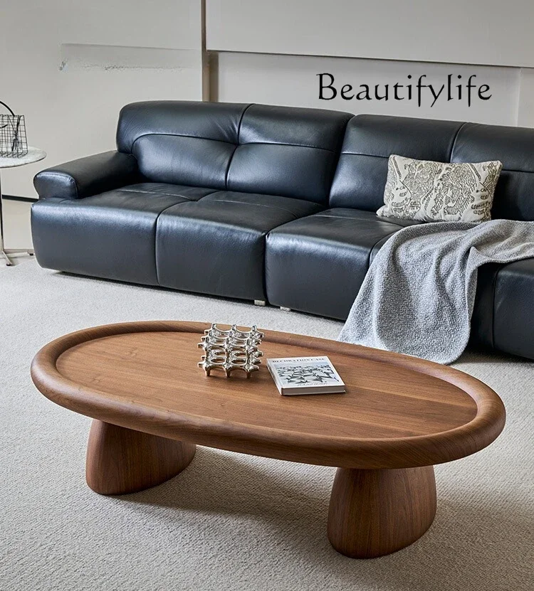 

Italian minimalist oval black walnut coffee table living room modern simple light luxury high-end coffee table