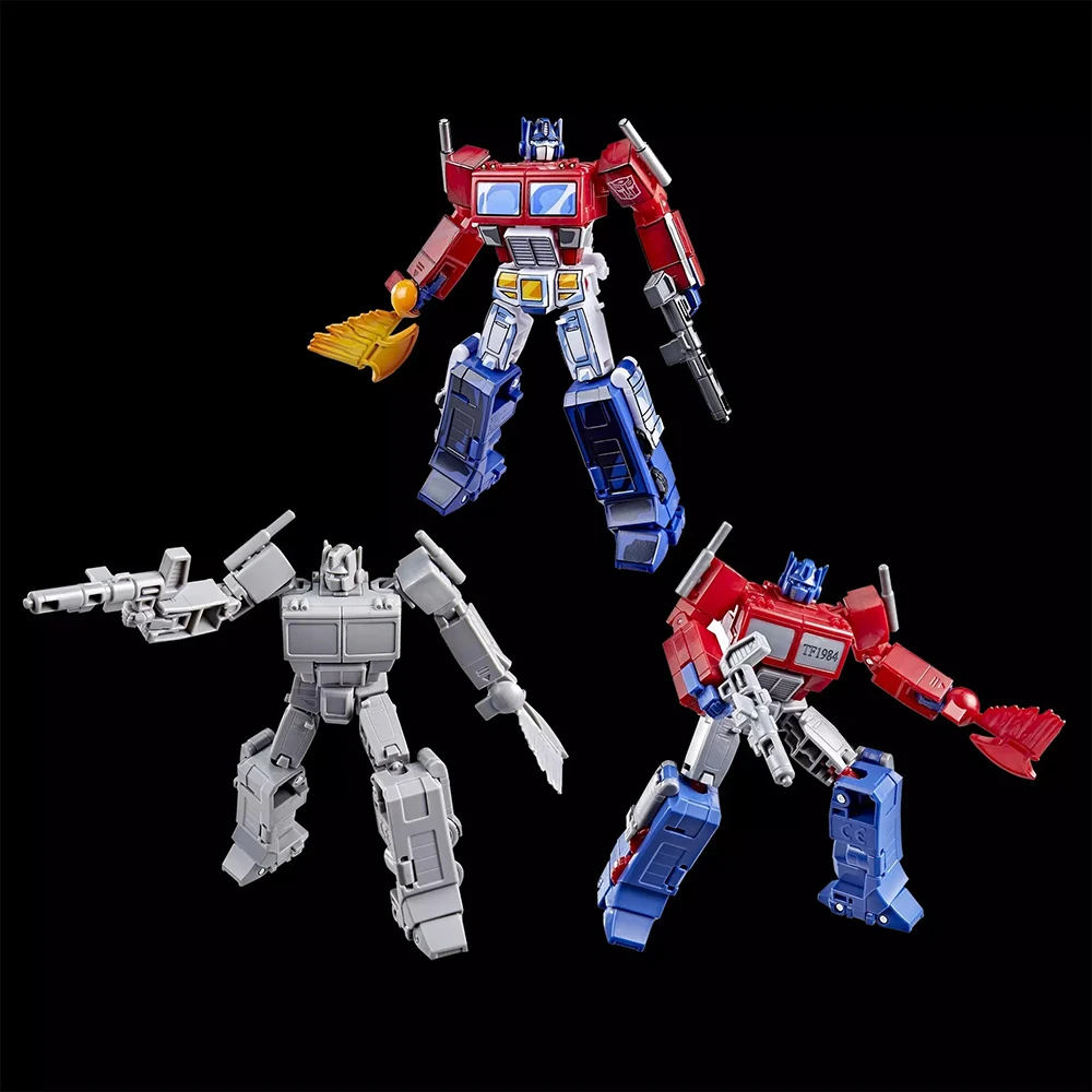 Faretto originale Hasbro Transformers Optimus Prime (modello grigio, prototipo e produzione) Confezione da 3 giocattoli di classe Deluxe da 11,5 cm