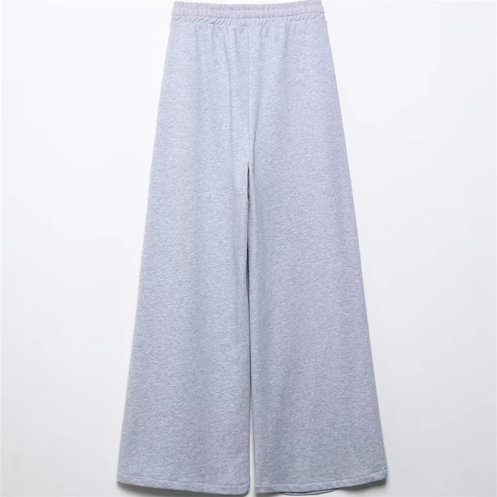 เสื้อผ้าผู้หญิงใหม่สำหรับฤดูใบไม้ร่วง สไตล์ยุโรปและอเมริกา เสื้อสเวตเชิ้ตปักลายพิมพ์ กางเกงจ็อกกิ้งทรงหลวมขายาว