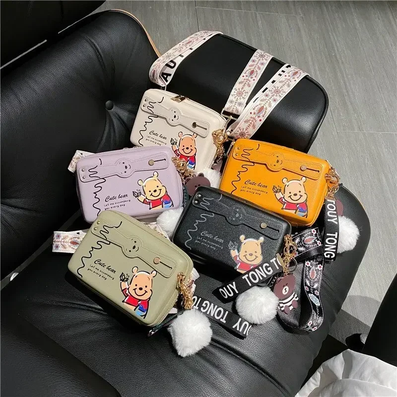 Disney Winnie The Winnie yeni kadın askılı omuz çantası karikatür sevimli kadın omuz Crossbody çanta moda trendi Mini kadın çantası