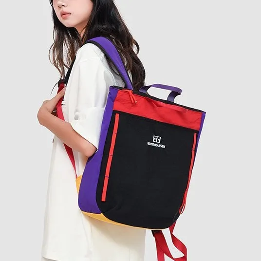 Nylon fabric ultra-light large-capacity portable schoolbag with color-blocking splicing, multi-functional hand-held hiking bag