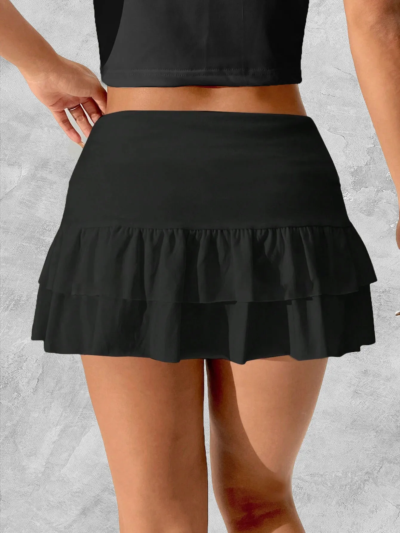 Solid color women's ruffled hem skirt, casual trendy sexy miniskirt, spring and summer playful women's skirt shorts to prevent